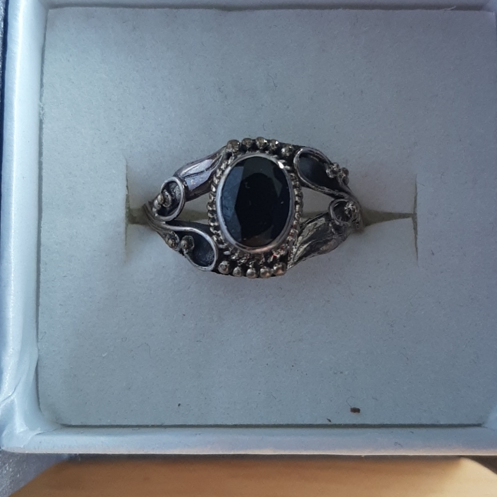 Black and silver ring